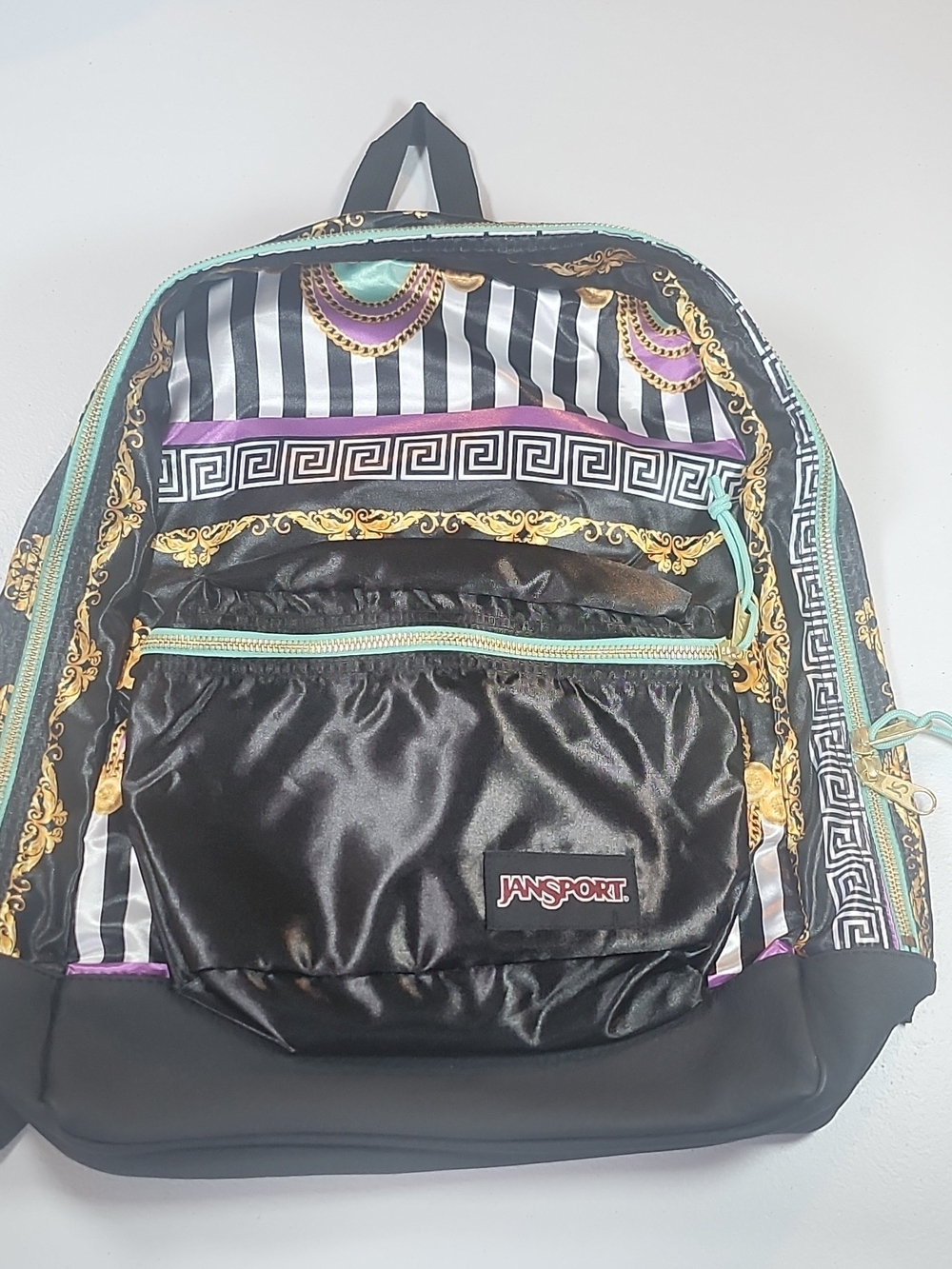 Jansport Black Backpack with Gold and Mint Accents